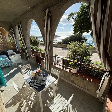 Lungomare Chess Apartment S'archittu Bagian luar foto