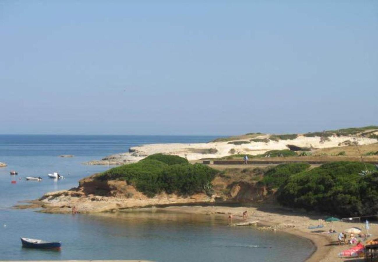 Lungomare Chess Apartment S'archittu Bagian luar foto