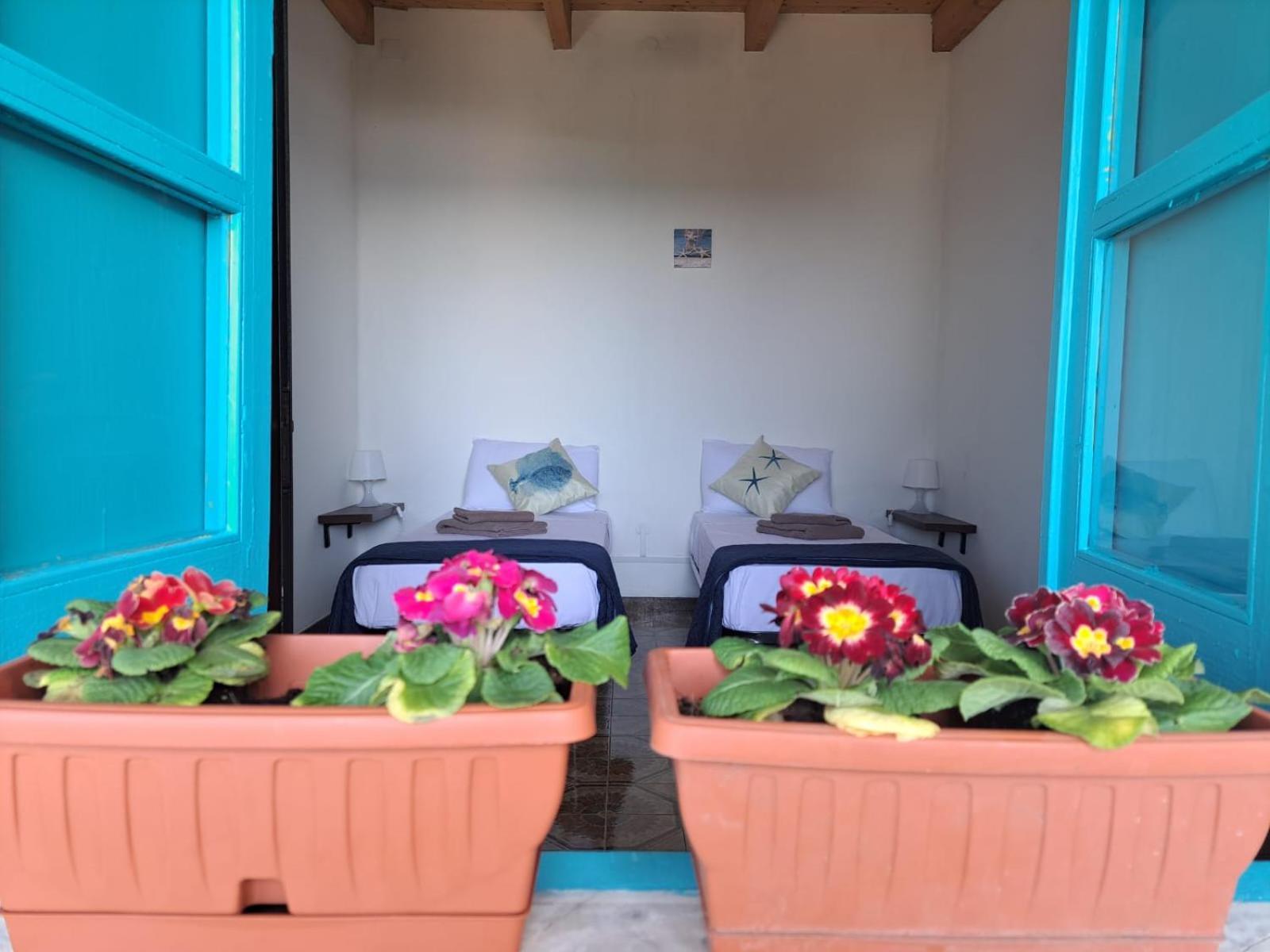 Lungomare Chess Apartment S'archittu Bagian luar foto