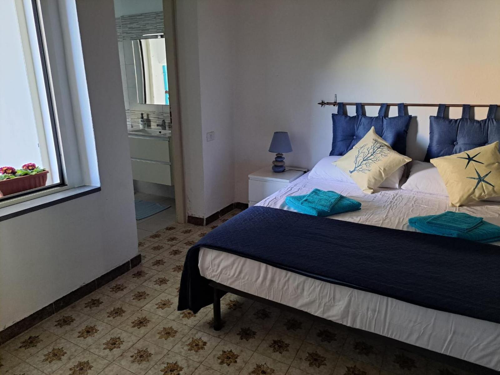 Lungomare Chess Apartment S'archittu Bagian luar foto