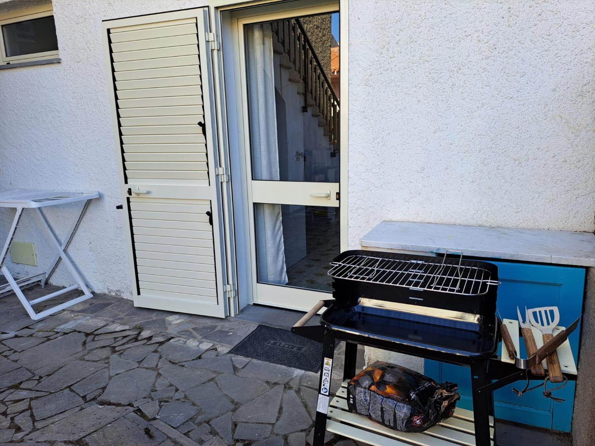 Lungomare Chess Apartment S'archittu Bagian luar foto